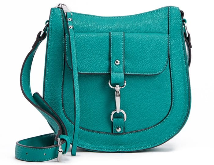 An adjustable shoulder strap and front pocket with a hardware detail complete this small but mighty look