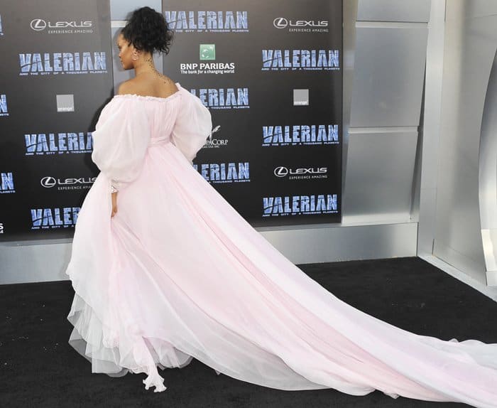 The Giambattista Valli couture gown features a dramatic cascading train