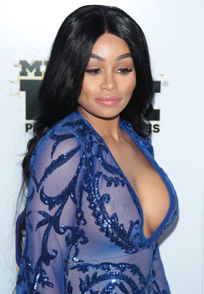 Blac Chyna flaunted her curves in a sparkly blue plunging dress