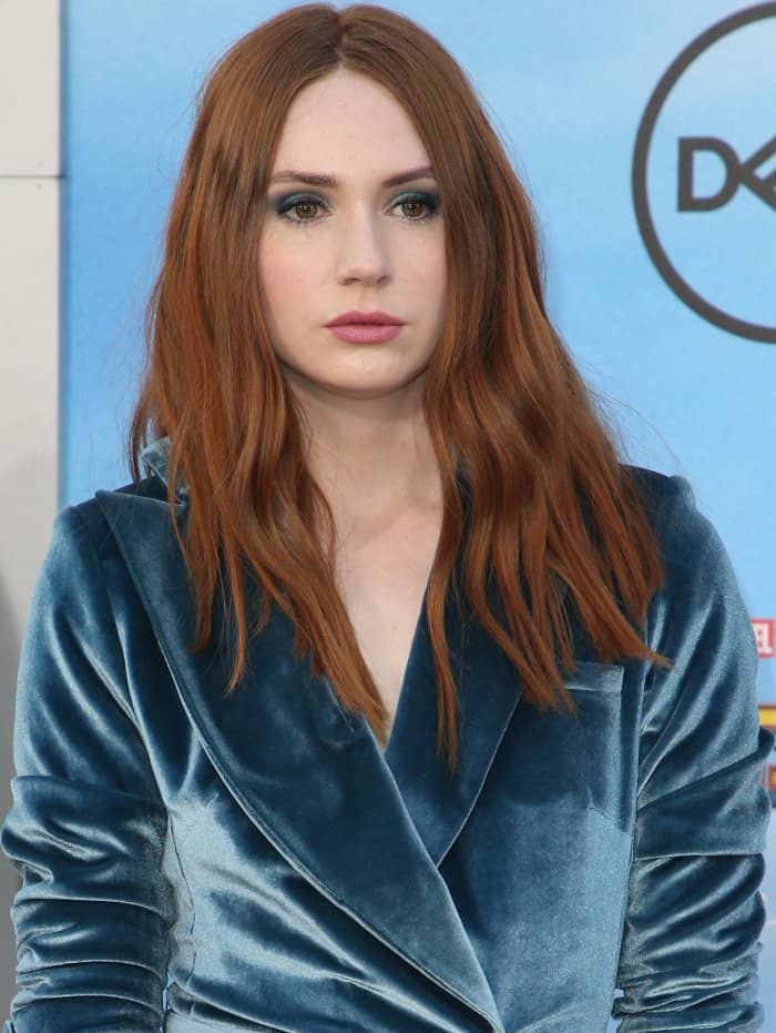 Karen Gillan wearing a blue Self-Portrait Fall 2017 velvet dress and Giuseppe Zanotti "Darsey" sandals at the "Spider-Man: Homecoming" LA premiere