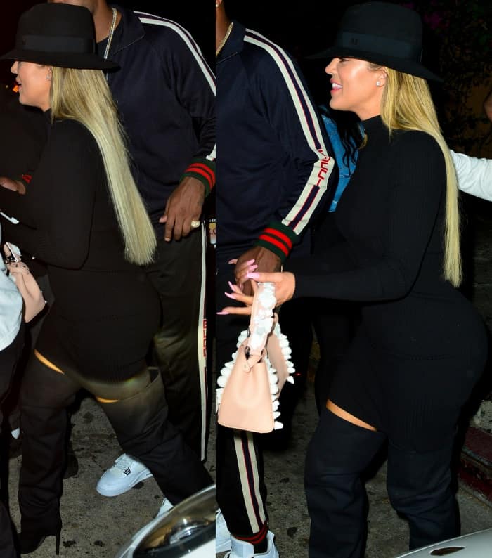 Khloé Kardashian wearing a Naked Wardrobe dress, a Maison Michel fedora, and black slouchy over-the-knee boots