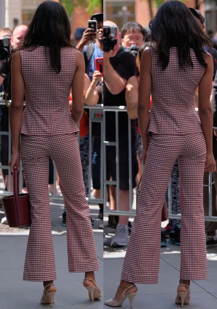 Laura Harrier wearing a Brock Collection Fall 2017 ensemble and Nicholas Kirkwood "Penelope Pearl" slingback pumps at AOL Build