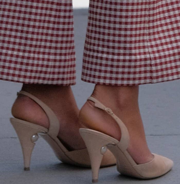 Laura Harrier wearing a Brock Collection Fall 2017 ensemble and Nicholas Kirkwood "Penelope Pearl" slingback pumps at AOL Build