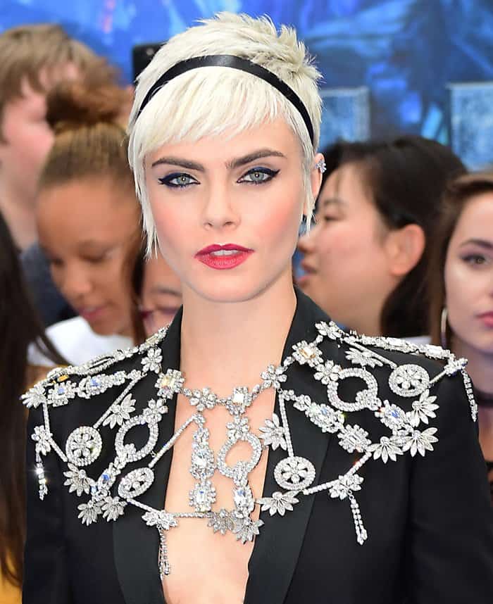 Cara amped up the glam with a statement jewelry at the premiere of Valerian.