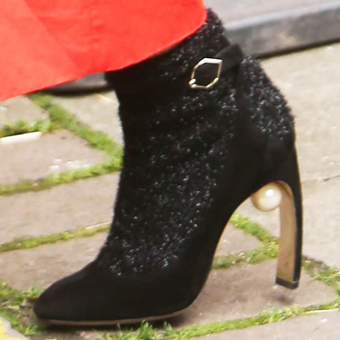 The Nicholas Kirkwood "Lola" boots fuse an ankle strap pump with glitter "socks"