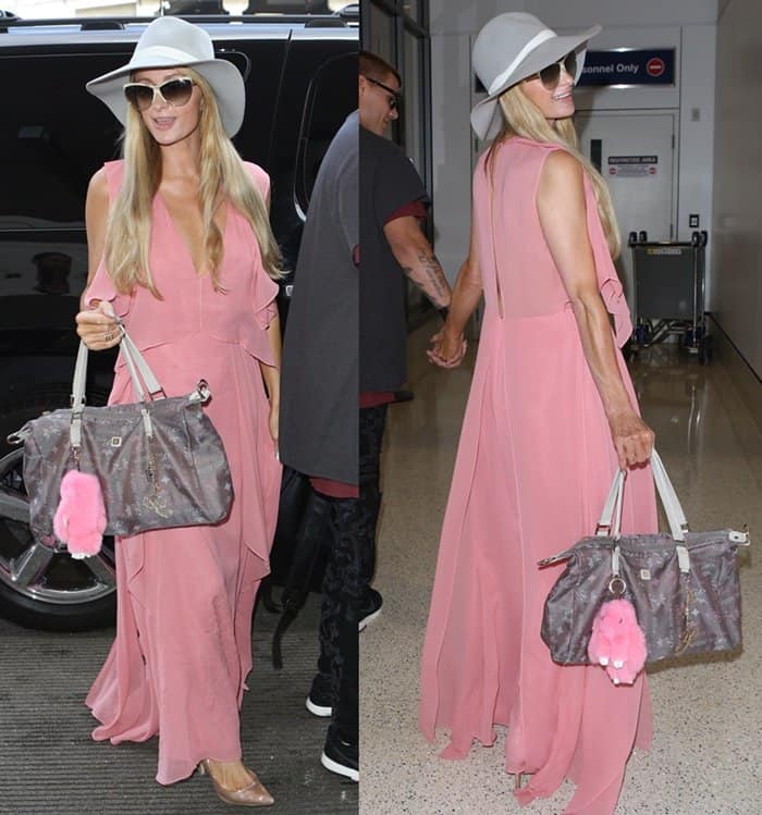 Paris Hilton turned heads at LAX on August 25, 2017, in a flowy BCBG Max Azria maxi dress paired with holographic pointed-toe silver heels and a tote from her handbag line