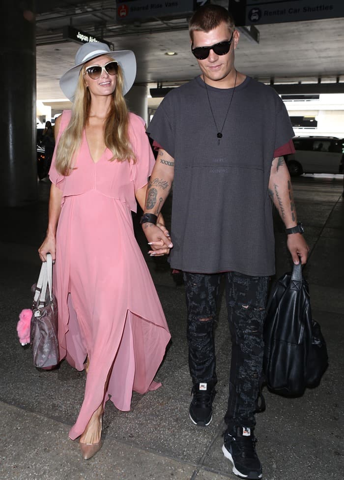 Paris Hilton with boyfriend Chris Zylka at LAX.
