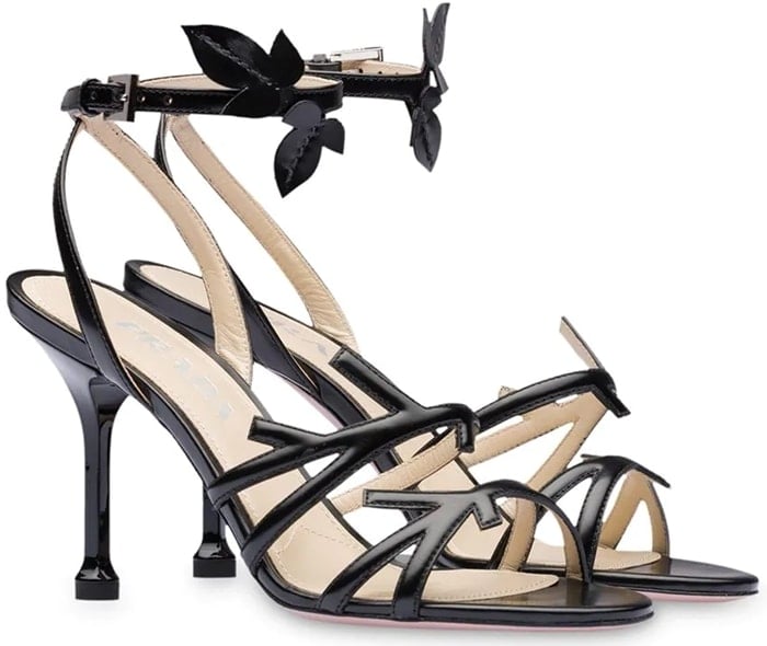 These black leather foliate-style 90mm sandals from Prada are a subtly stylish and utterly wearable pair