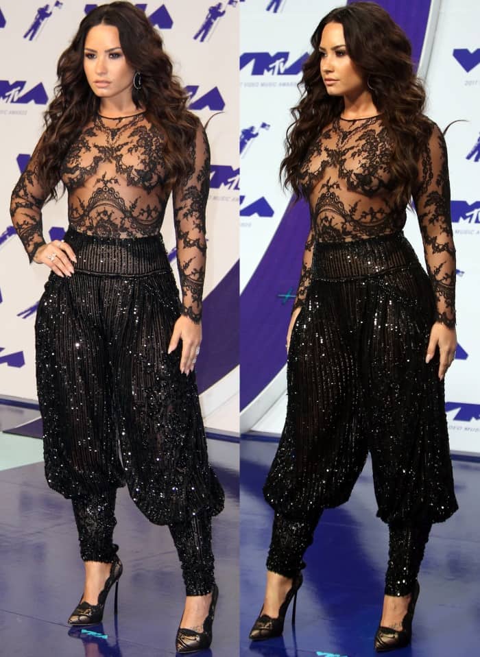 Demi Lovato wearing an all-black Zuhair Murad Fall 2016 Couture ensemble with Casadei lace pumps at the 2017 MTV Video Music Awards