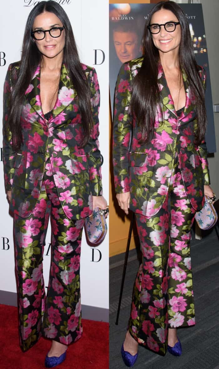 Demi Moore styled her Gucci floral printed suit with Moscot glasses and a Gucci clutch