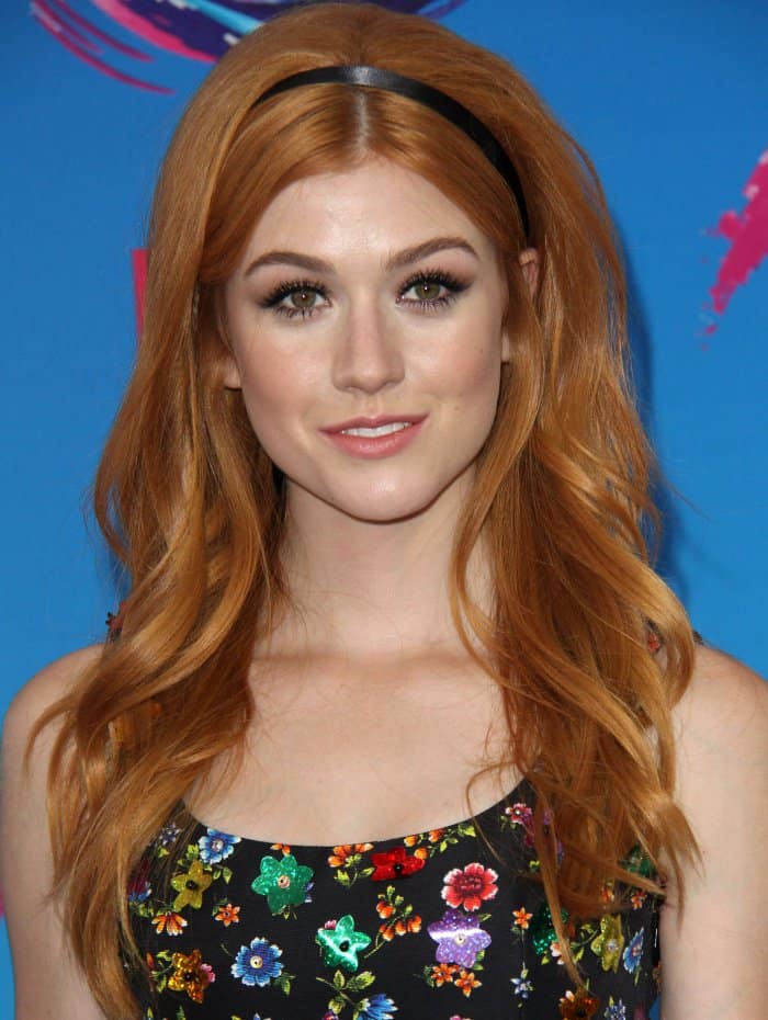 Katherine McNamara looked charming in a stunning floral-beaded dress by Moschino and elegantly styled layered tresses