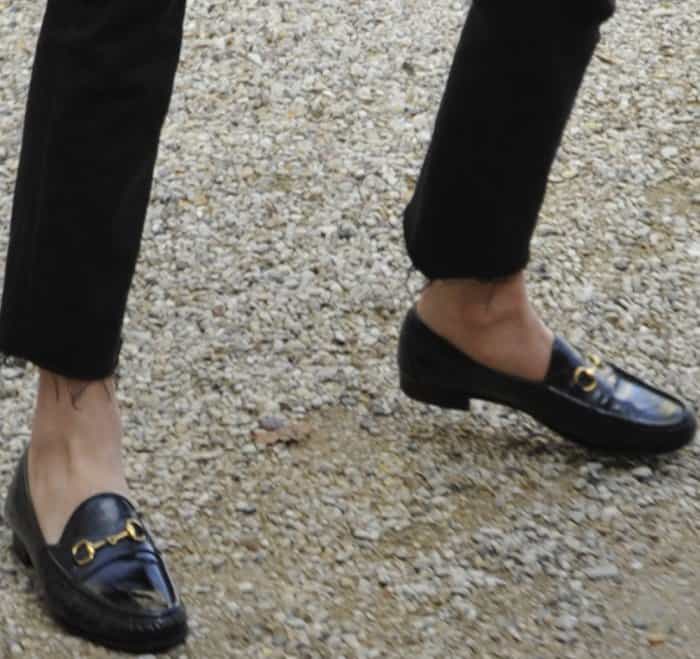 Lily Donaldson wearing black Gucci loafers before the Balmain Fall/Winter 2017 show during Paris Fashion Week