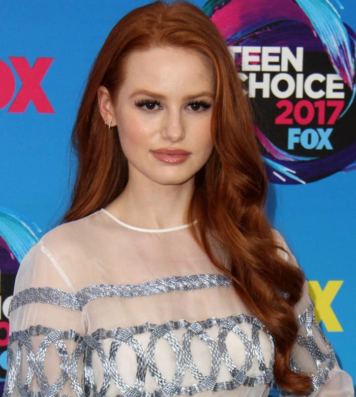 Madelaine Petsch turned heads in a Genny white silk embroidered blouse at the Teen Choice Awards 2017