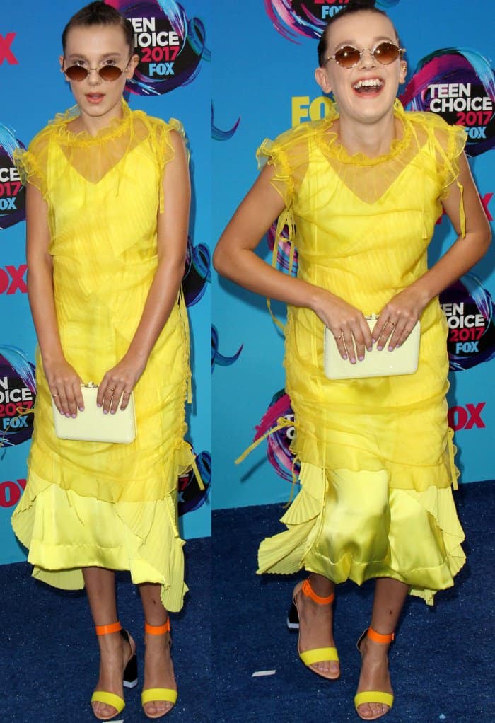 Millie Bobby Brown's yellow Kenzo dress with ruffle details and a tulle overlay