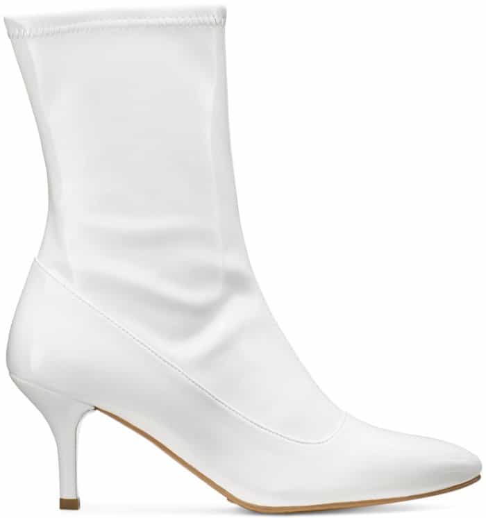 Stuart Weitzman “Clingy” booties in snow white patent leather