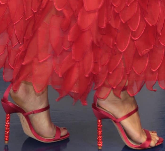 Vanessa Hudgens shows off her feet in red Sophia Webster heels