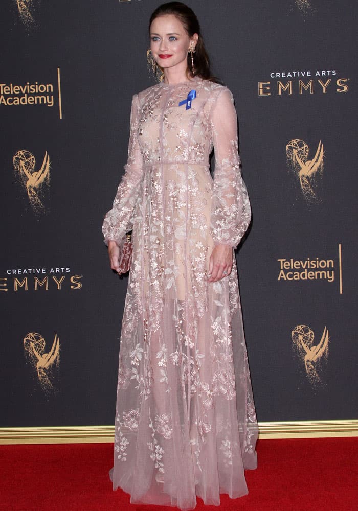 Alexis Bledel donned a captivating sheer dress adorned with intricate embroidered floral patterns by J. Mendel