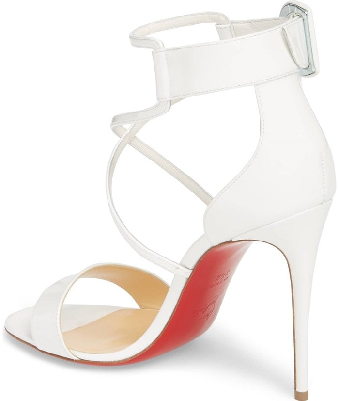 Slim crossover straps heighten the retro sophistication of this impeccably crafted Italian sandal
