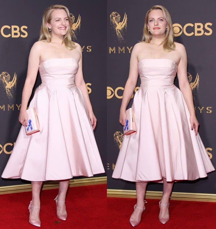 Elisabeth Moss wearing a pink gown on the 69th Emmy Awards red carpet.