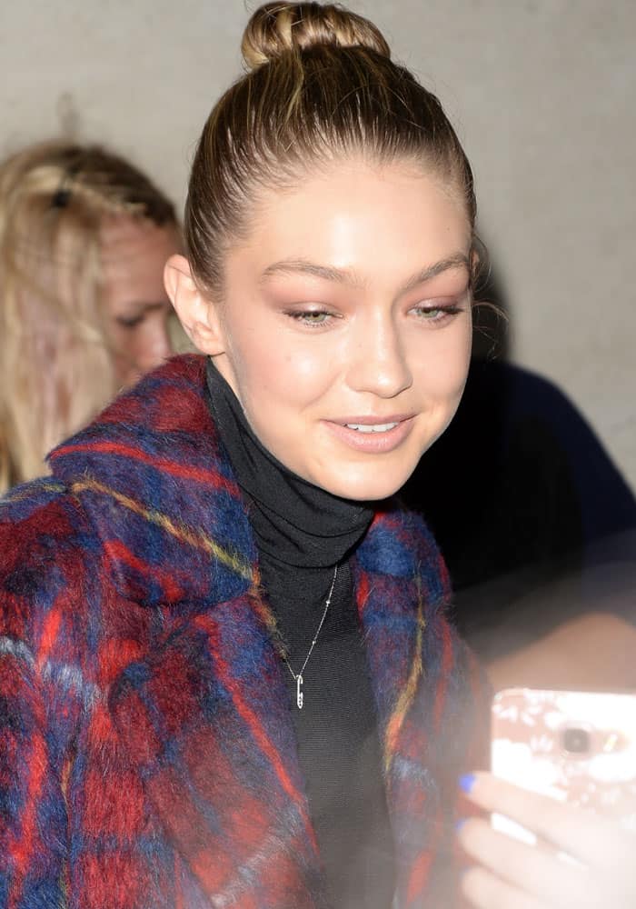Gigi Hadid leaves her hotel to attend a fitting at the Tommy Hilfiger store in Knightsbridge