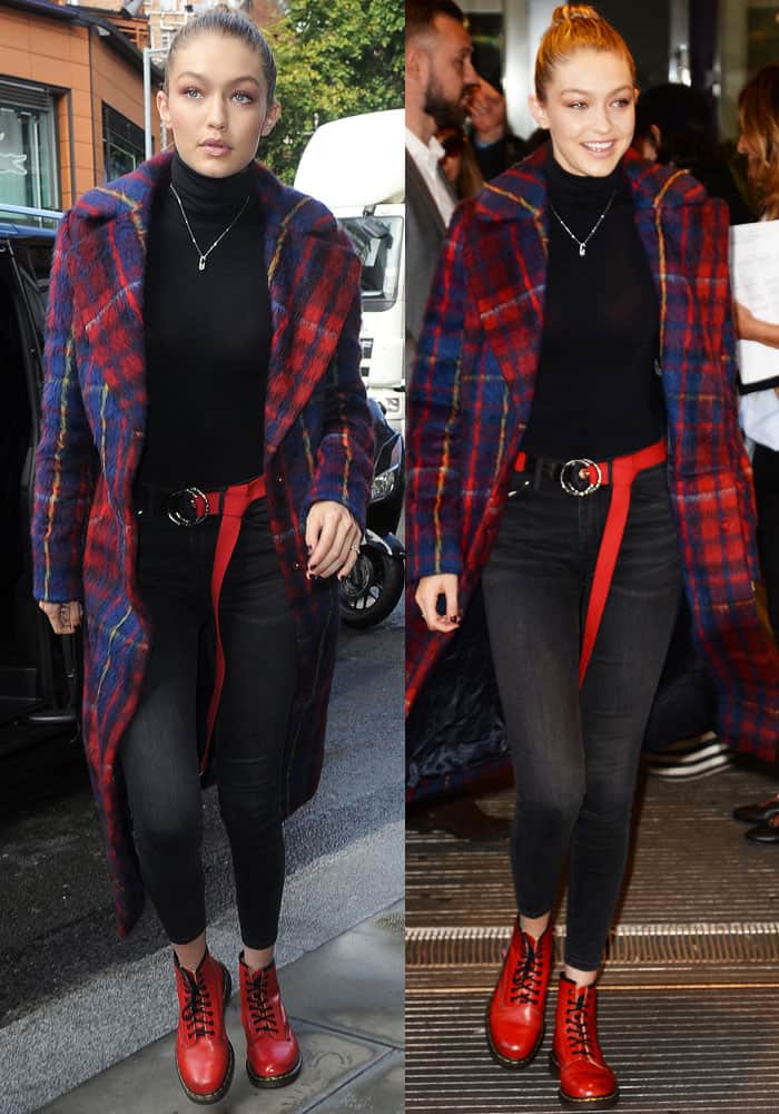 Gigi Hadid was stylishly clad in a plaid coat and stretch denim jeans, which were set to make their runway debut the following day