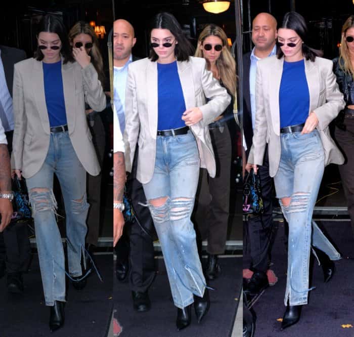 Kendall Jenner in NYC wearing distressed jeans, oversized blazer and Balenciaga "Knife" booties.