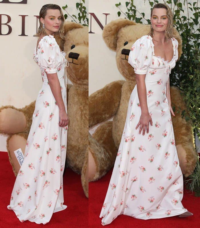 Margot also posed with a giant-sized teddy bear on the red carpet