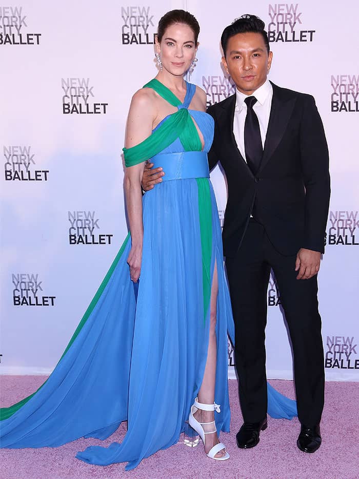 Michelle Monaghan posing on the pink carpet with the fashion designer Prabal Gurung while wearing a Prabal Gurung Spring/Summer 2018 look.