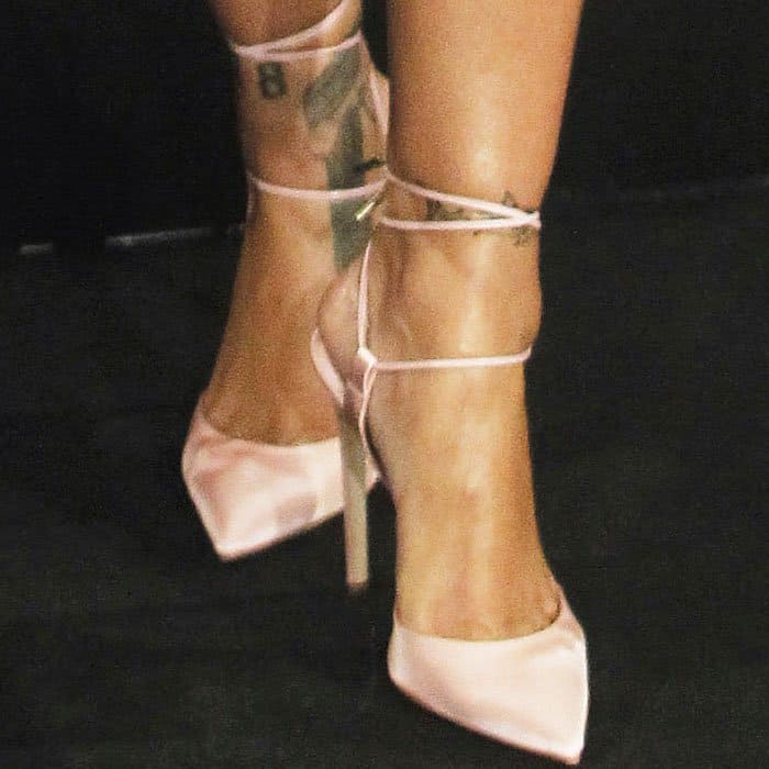 The pop star wore a pair of blush tone Olgana Paris "L'Attachante" pumps in satin