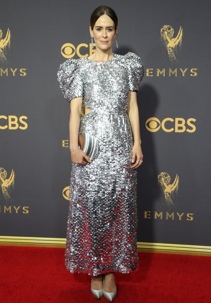 Sarah Paulson in a silver sequined Carolina Herrera dress and matching silver Stuart Weitzman pumps.