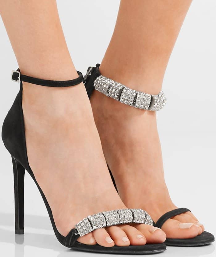 Rows of crystals dazzle and shine on a lofty, calfskin-suede sandal finished with a slim ankle strap