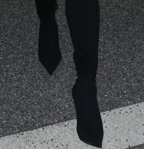 Chrissy Teigen Strolls Through LAX in Balenciaga Sock Boots