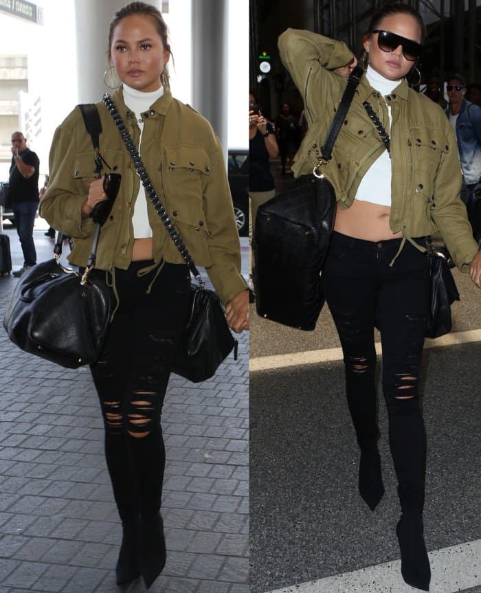 Chrissy Teigen wearing a Faith Connexion military jacket, Off-White top, Frame skinny jeans, and Balenciaga stretch-jersey sock boots at LAX