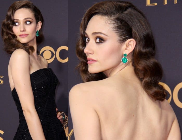 Emmy Rossum wearing a strapless black gown from Zac Posen and emerald jewels from Lorraine Schwartz at the 69th Emmy Awards
