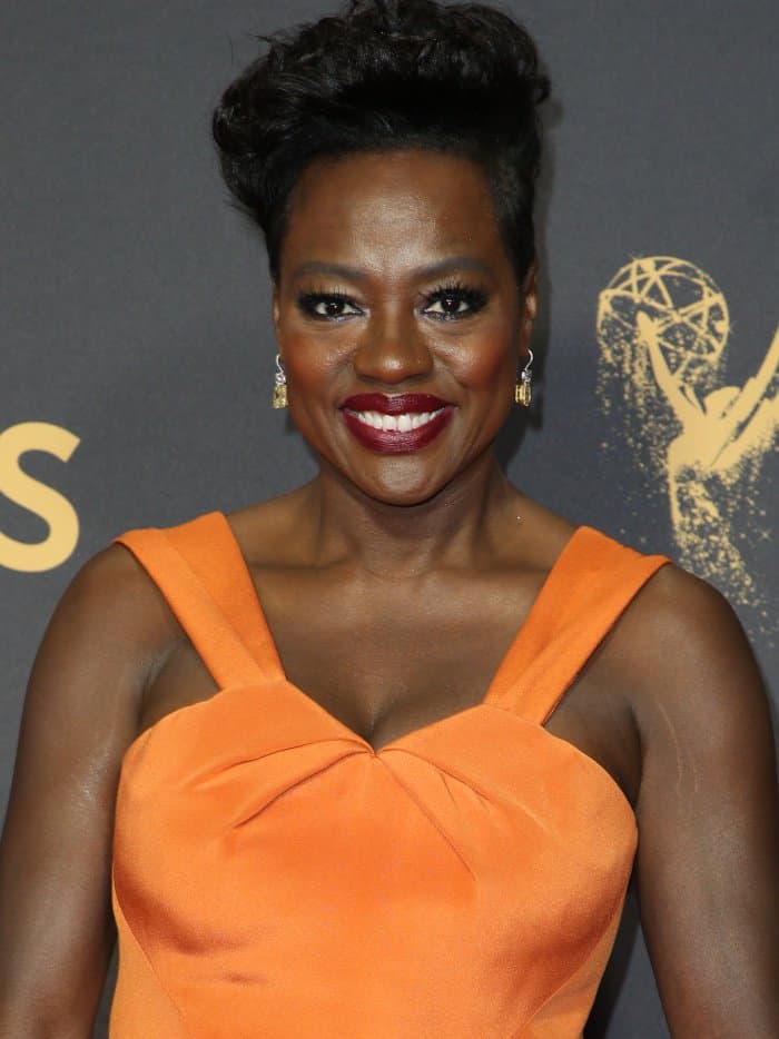 Viola Davis wearing a custom tangerine gown by Zac Posen at the 69th Emmy Awards