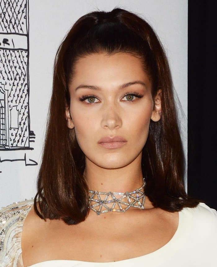 Bella Hadid wears a diamond choker necklace at the Bvlgari flagship store opening in NY.