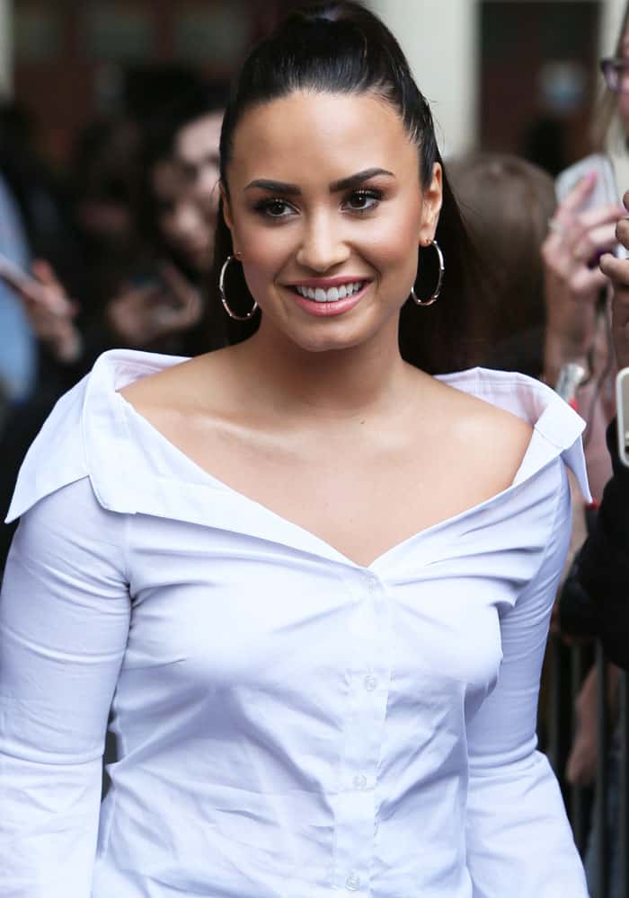 Demi Lovato promotes her album at Kiss FM Studios and BBC Radio 1 Studio in London on September 27, 2017