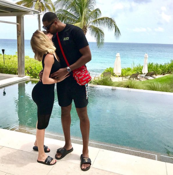 Khloé Kardashian and Tristan Thompson share a sweet kiss for an Instagram photo.