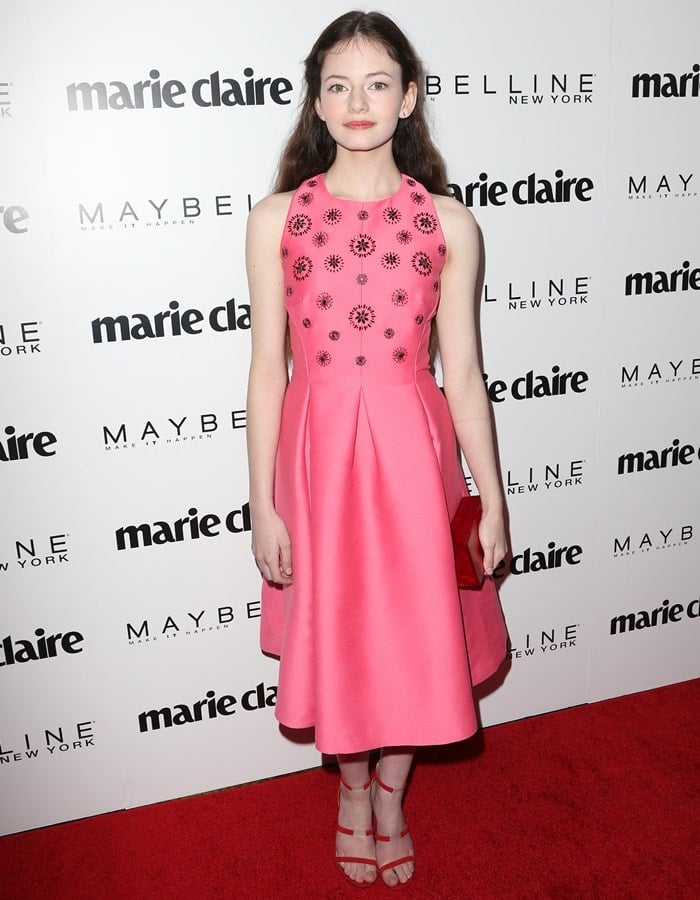 Mackenzie Foy wearing a pink embellished Kate Spade New York dress