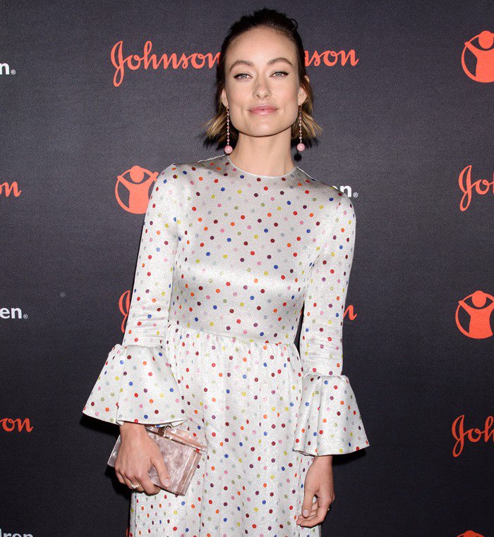 Olivia Wilde looked glamorous in a polka dot dress from the Valentino Spring 2018 collection featuring frill sleeves