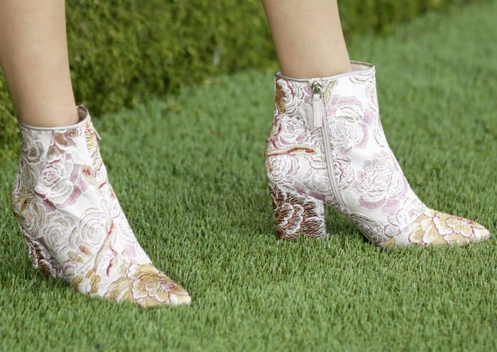 Not your typical polo shoes: Victoria picked out a pair of jacquard print "Savitra" boots from Nine West