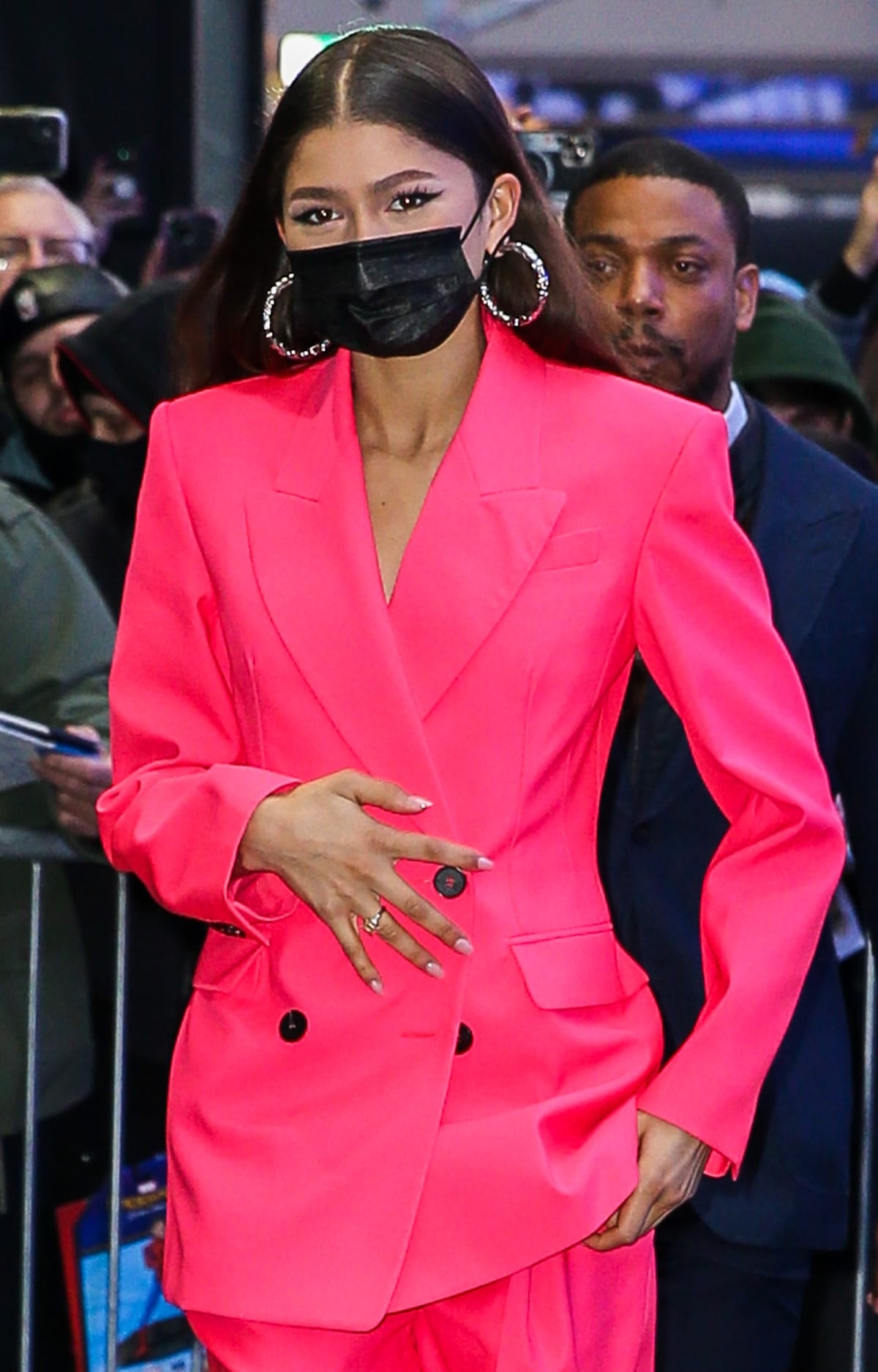 Zendaya styled her oversized double-breasted blazer with hoop earrings named after celebrity stylist Maeve Reilly