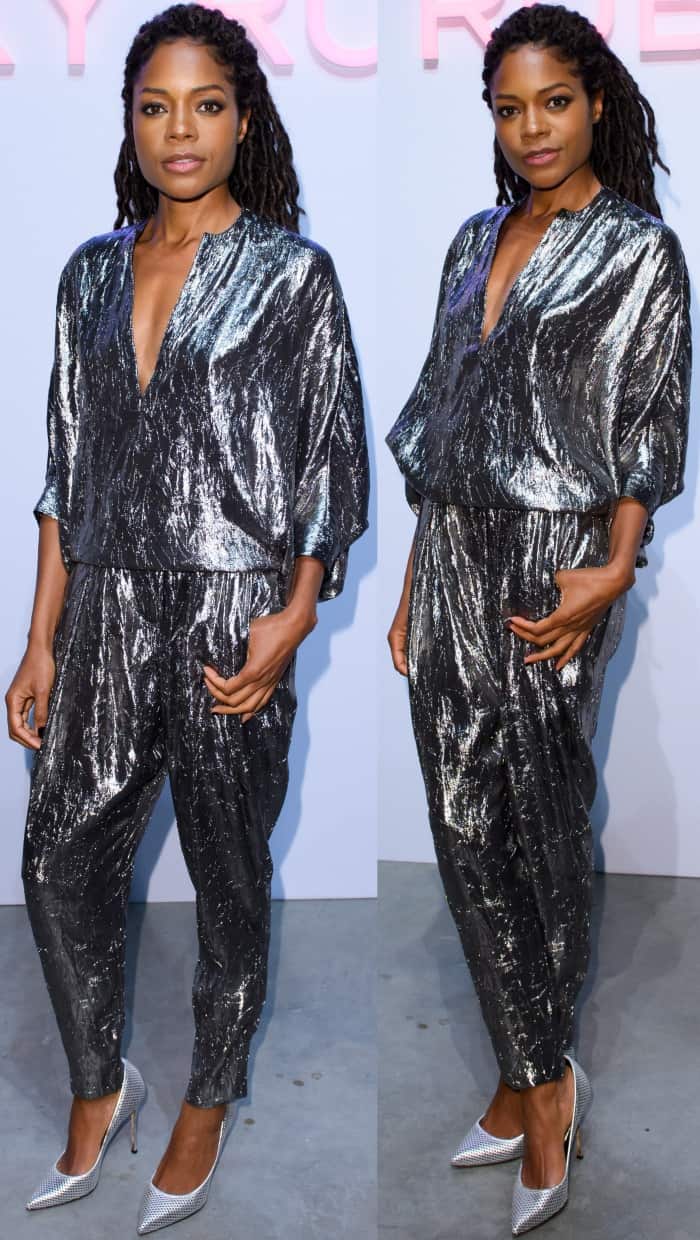 Naomie Harris wearing a Michael Kors Collection crushed silver silk-blend lamé blouse and matching tapered pants with silver pointy-toe pumps at the Michael Kors "Sexy Ruby" fragrance launch in London