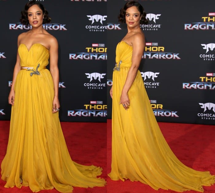 Tessa Thompson exudes Old Hollywood glamour in a strapless marigold Schiaparelli Couture gown with a sweetheart neckline and embellished waist at the Thor: Ragnarok premiere—though her shoes are hidden beneath the flowing skirt