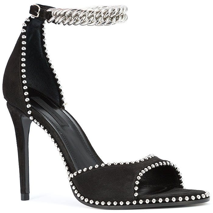 Alexander Wang's 'Tilda' sandals feature bold chain ankle straps and sleek silver stud detailing