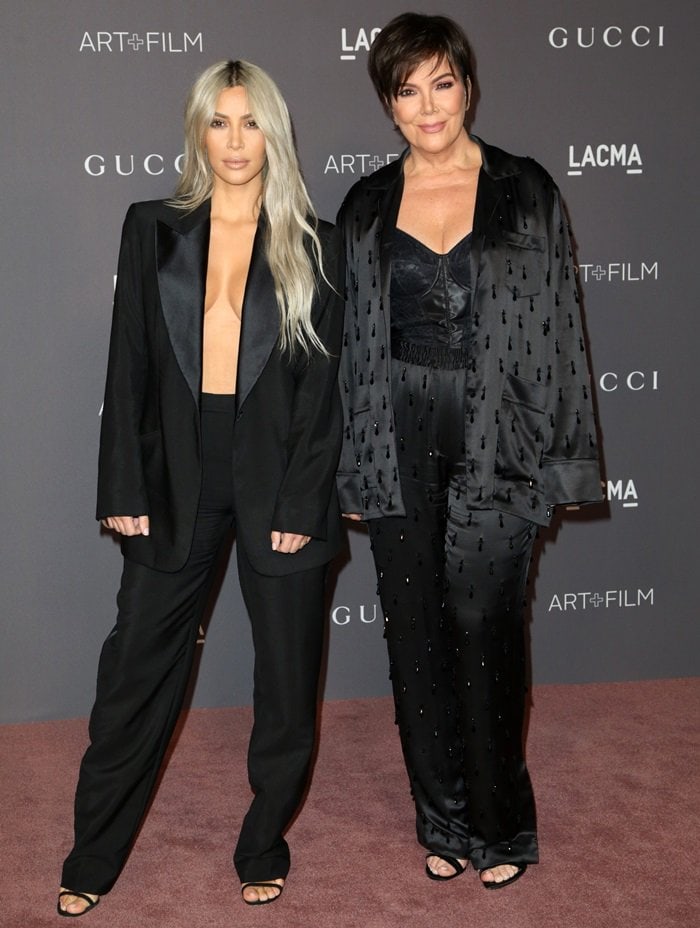 Kim Kardashian wore a vintage Tom Ford tuxedo and strappy sandals, and Kris Jenner a silk jacket and pants