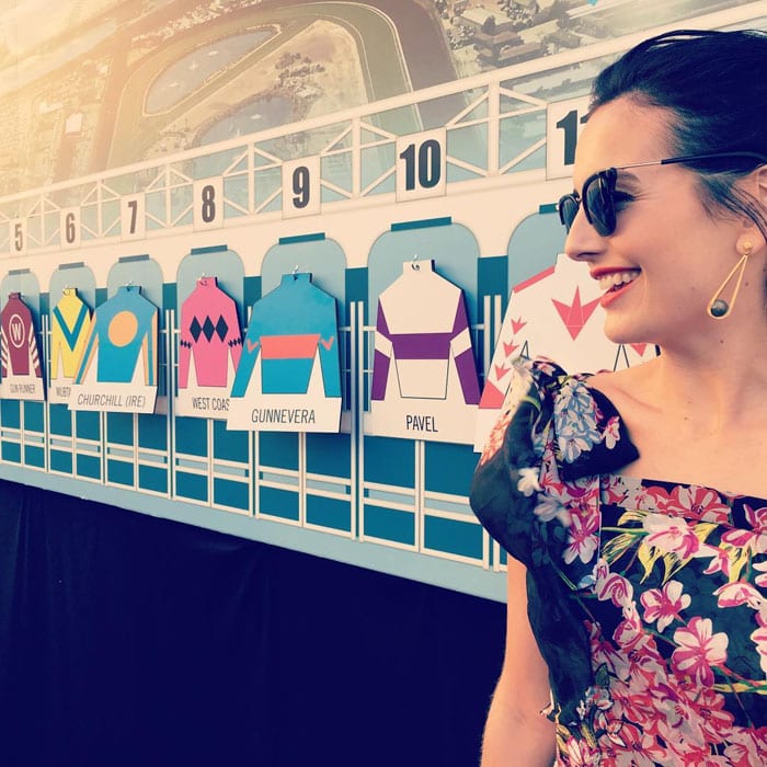 Camilla uploads a photo at the Breeders Cup with the caption, "Who will win??? #breederscup#delmar #racetime"