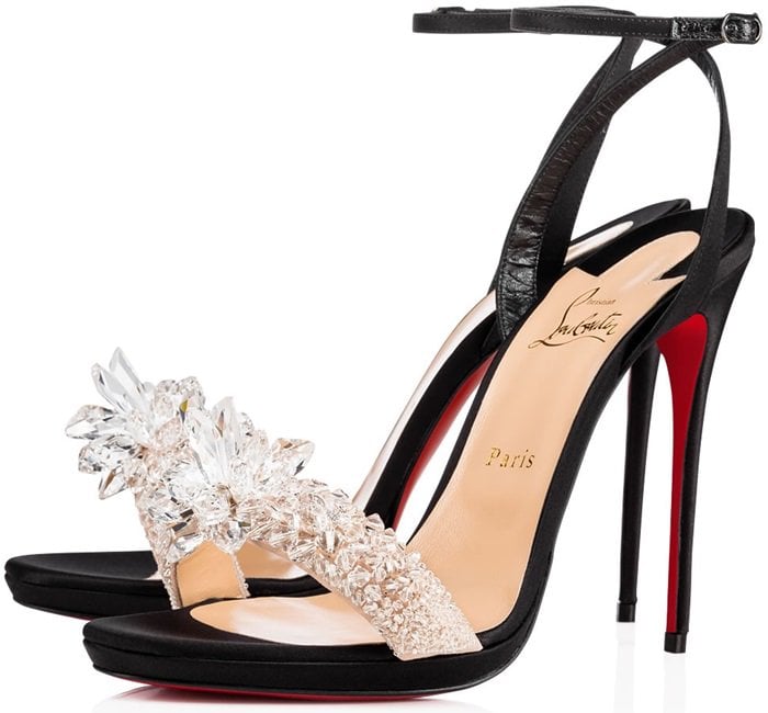 This slender platform sandal is encrusted in dazzling crystal shards of varying sizes