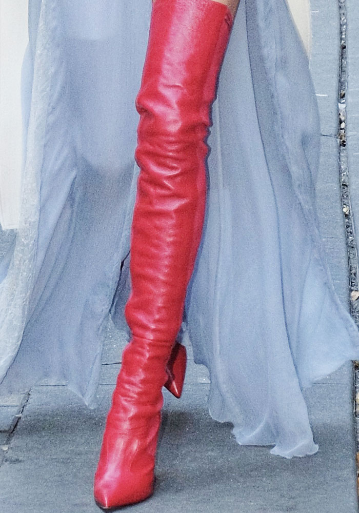 Elsa Hosk contrasts her feminine look with leather thigh-high Fendi "Rockoko" boots