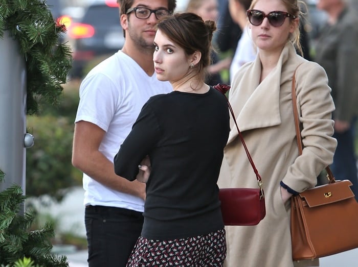 Emma Roberts wearing baggy printed pants while out shopping with friends in Beverly Hills on December 5, 2012